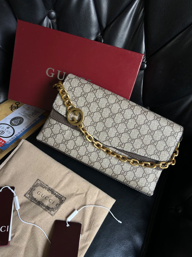 Gucci GG Beige Embossed Leather Bag – Premium Store Article  Product Number: 1059